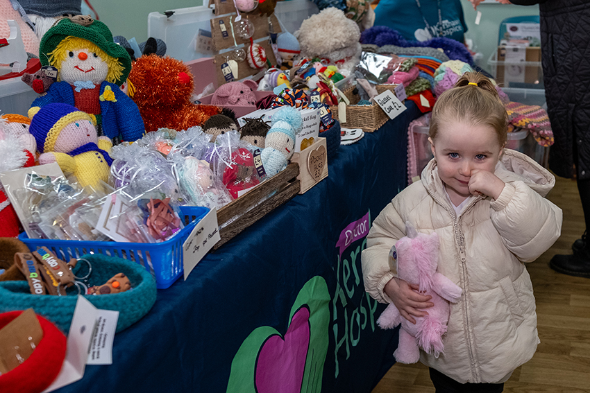 A young shopper enjoys the stalls