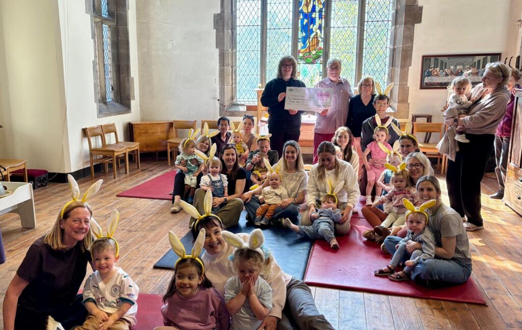 Children from a church playgroup wearing bunny ears
