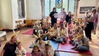 Children from a church playgroup wearing bunny ears