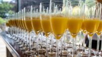 Glasses of Buck's fizz lined in a row
